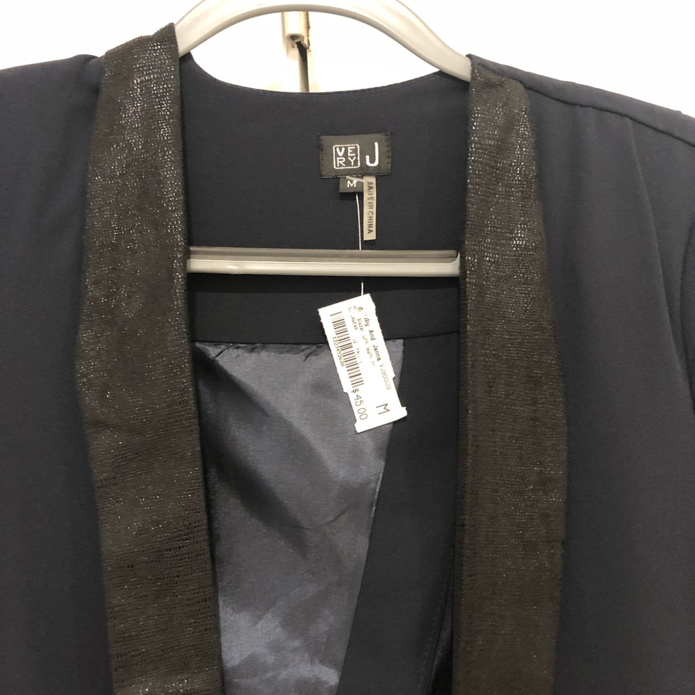 Navy blazer with black accents